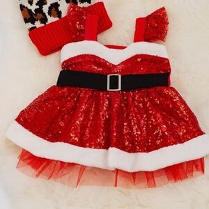 Santa Baby Red Sequin Dress Onesie with faux white fur accent and black belt.